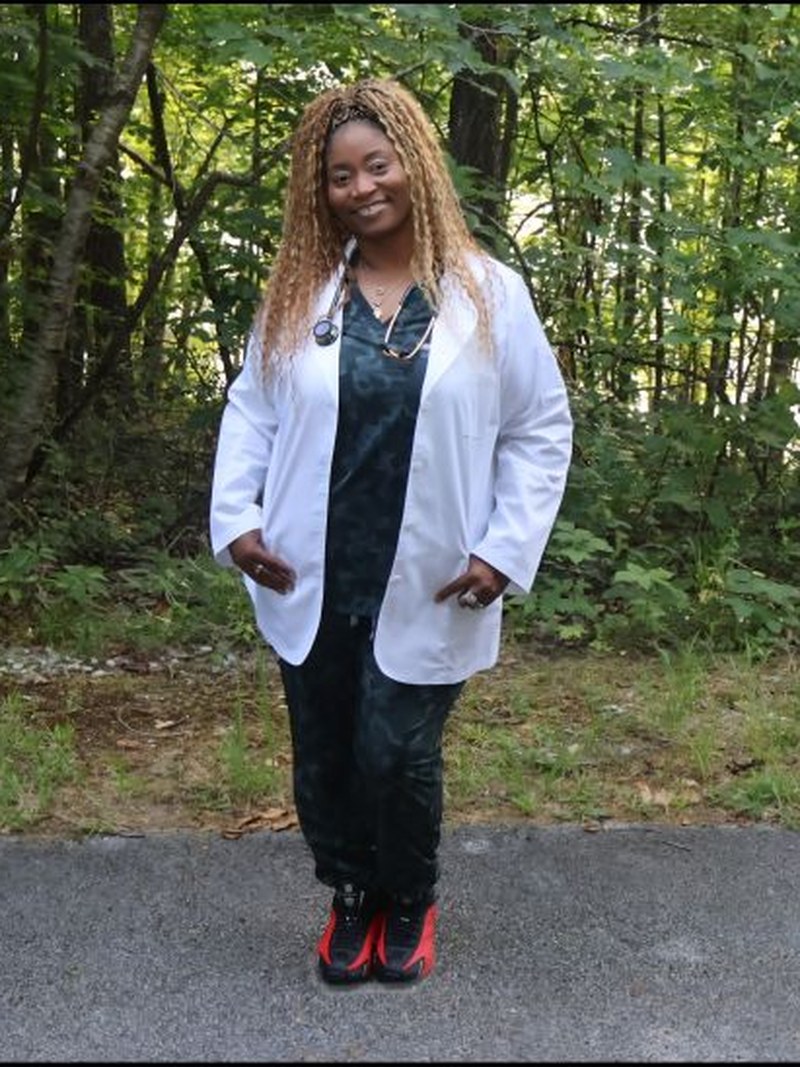 LaShounn Stevenson, RN, in lab coat